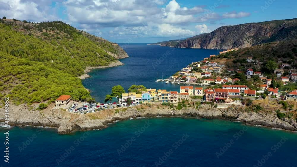 Aerial drone view video of beautiful and picturesque colorful traditional fishing village of Assos in island of Cefalonia, Ionian, Greece. Peninsula of Assos in Cephalonia (Kefalonia), Greece Aerial drone view video of beautiful and picturesque colorful traditional fishing village of Assos in island of Cefalonia, Ionian, Greece. Peninsula of Assos in Cephalonia (Kefalonia), Greece