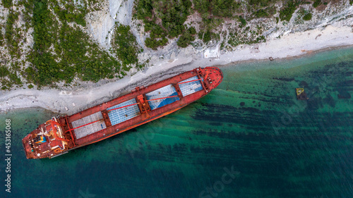Sea tanker, dry cargo ship, washed ashore after a storm, aerial view