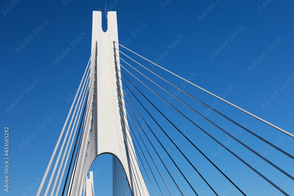 Obraz premium Suspension bridge and one of the largest suspension bridges in Portugal. Sunny day, travel concept