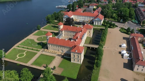 Lake Grienerick and Rheinsberg Palace is a castle in Brandenburg, Germany photo