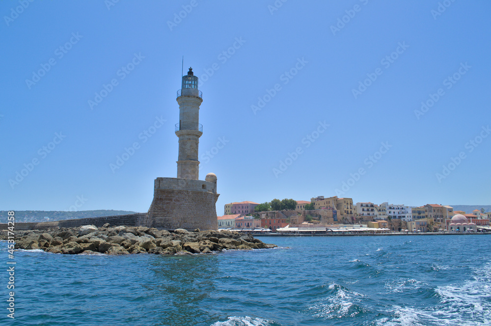 Sea lighthouse in summer in sunny cloudless weather. Lighthouse in Chania