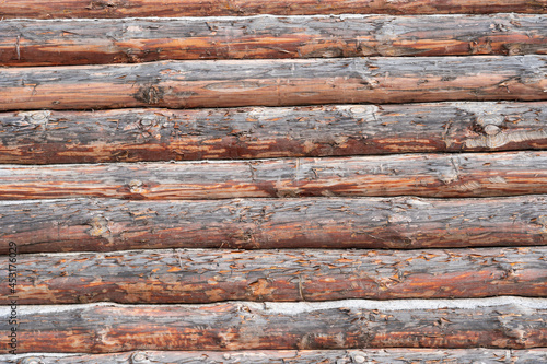 House wall in the village. Russian masonry of logs in the southern Urals.