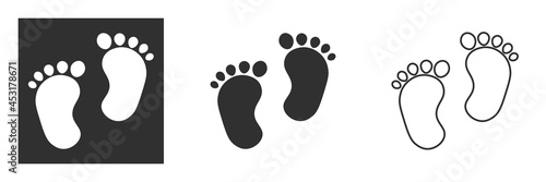 Child pair of footprint sign icon. Toddler barefoot symbol. Baby's first steps. Graphic design element photo