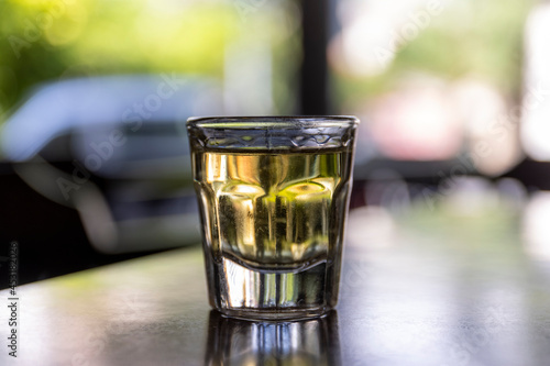 A small glass of 3cl full of brandy