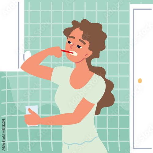 woman brushing teeth