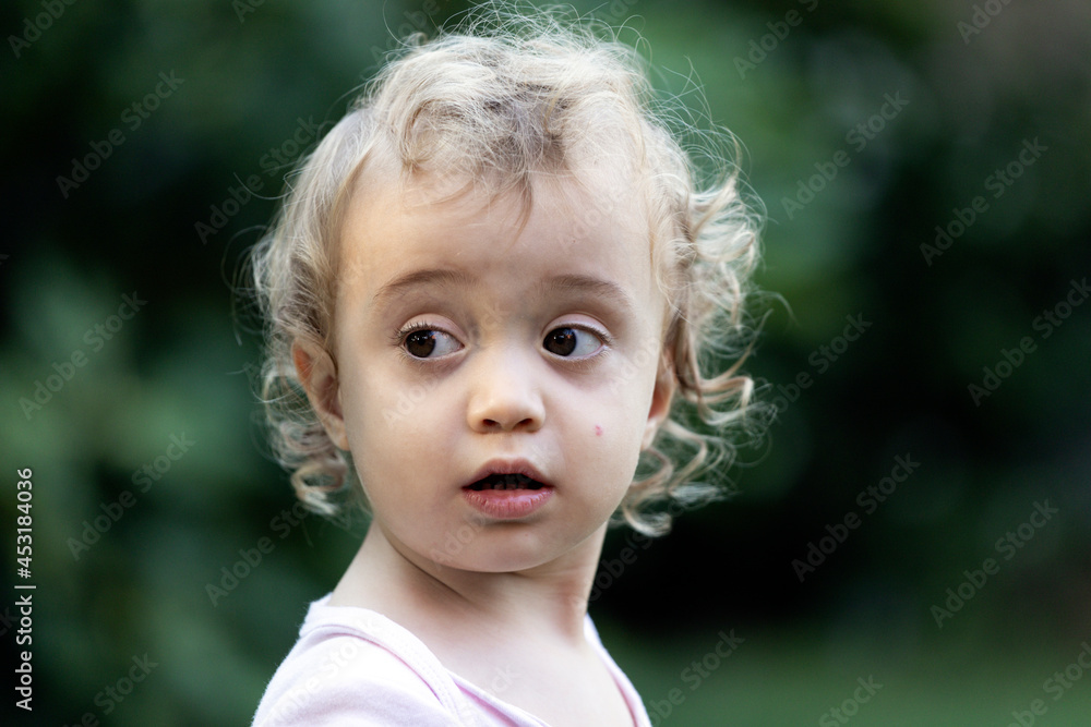 Portrait of beautiful curly baby girl Portrait of beautiful curly baby girl