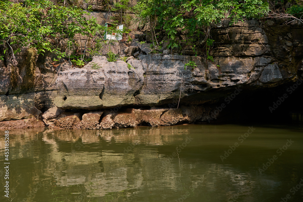 Crocodile cave on langkawi island. Tourist point, rock in the form of a crocodile's head Crocodile cave on langkawi island. Tourist point, rock in the form of a crocodile's head