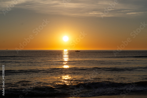 Beautiful sunrise at the sea beach © Pradip