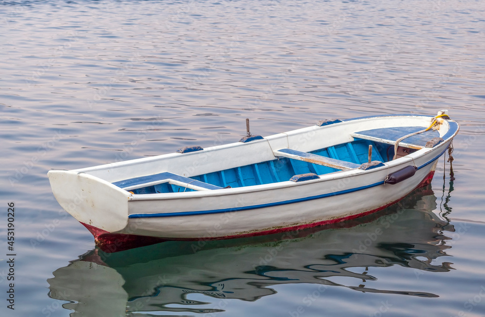 Empty fishing boat on the water. Empty fishing boat on the water.