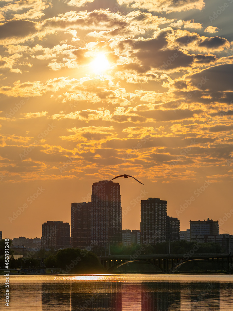 Sunset on a pond in the center of the city. Yekaterinburg, Russia