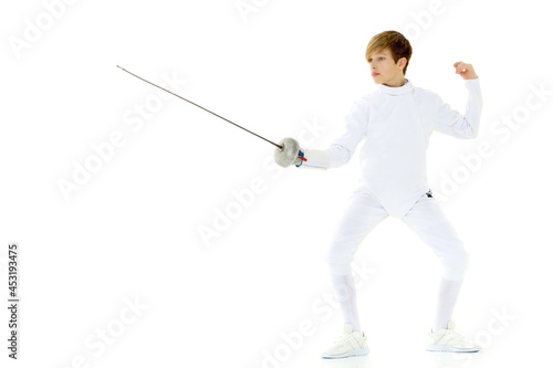 Fencer boy practicing effective technique © lotosfoto
