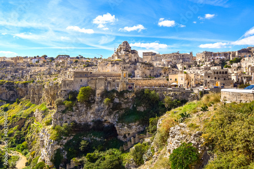 The steep cliffs and canyons and the ancient Madonna de Idris rock church in the city of Matera  Italy  in the Basilicata region.