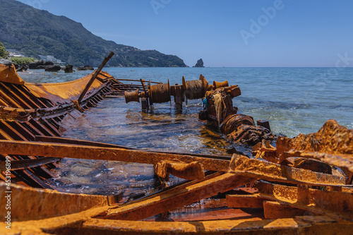 Shipwreck in Agios Gordios resort village on west shore of Corfu Island in Greece © Fotokon