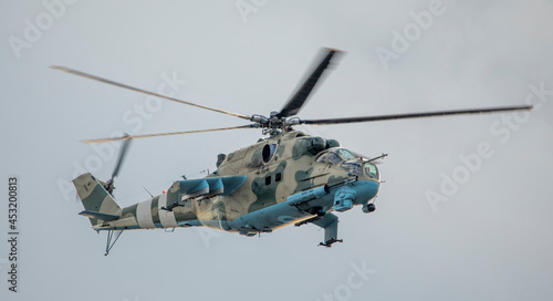 Wallpaper Mural Military helicopter on a mission on a background of the sky. Torontodigital.ca