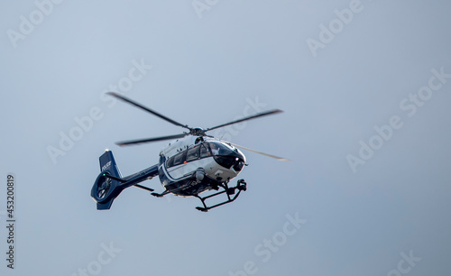 Police helicopter black and white. Modern, equipped with the latest equipment.