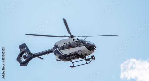 Police helicopter black and white. Modern, equipped with the latest equipment. photo
