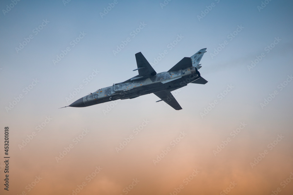 Military fighter plane with variable sweep wing on sky background. Military fighter plane with variable sweep wing on sky background.