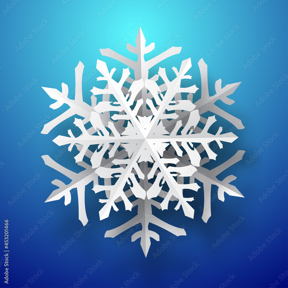 One big Christmas paper snowflake with soft shadow, white on blue background One big Christmas paper snowflake with soft shadow, white on blue background