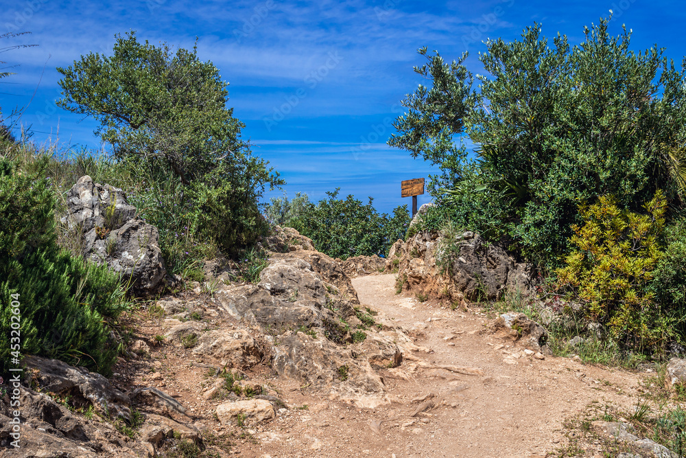 Trail in Zingaro natural reserve on the shore of Castellammare Gulf on Sicily Island, Italy