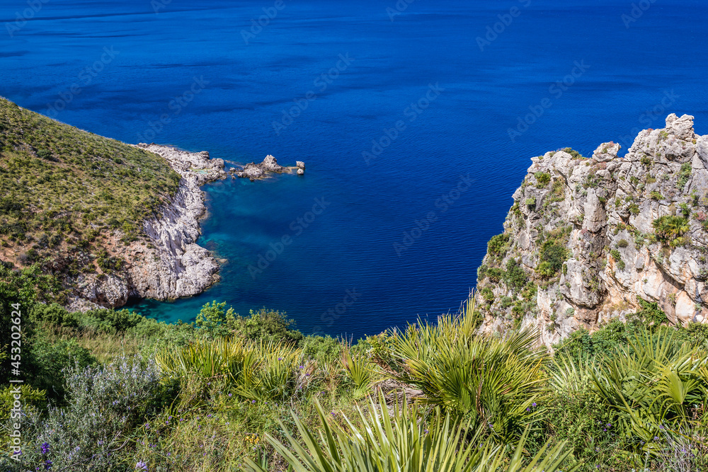 Punta Leone and Cala del Varo inlet in Zingaro natural reserve on the shore of Castellammare Gulf on Sicily Island, Italy