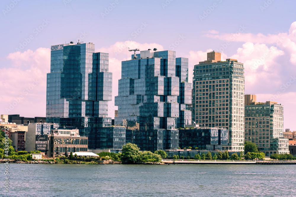 Brooklyn, NY - USA - July 30, 2021: Horizontal view of iconic 420 Kent Luxury Brooklyn Apartments in Williamsburg, Brooklyn. A luxury glass apartment complex on the East River