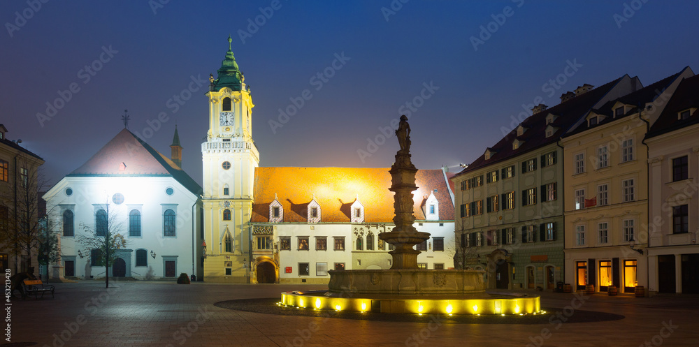 Night view of buildings and fountain on Main Square in Bratislava historic city center