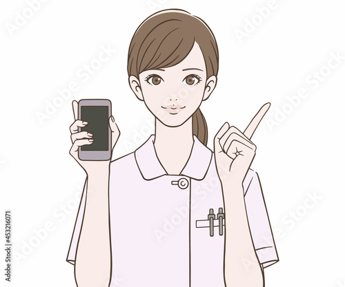 スマートフォンを持ち、人差し指を立てる看護師