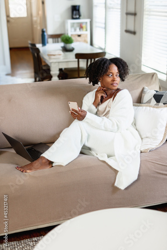 African American woman cozy and comfortable at home, weekend vibe