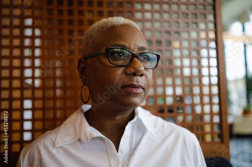 Portrait of mature Black woman, business, visionary with copy-space 