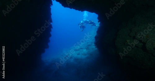 Wallpaper Mural underwater caves and tunnels with nice lightning  sun rays and sun beams relaxing ocean scenery backgrounds scuba divers to explore Torontodigital.ca