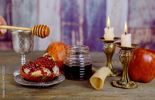 Jewish holiday Rosh Hashanah celebration on festive table