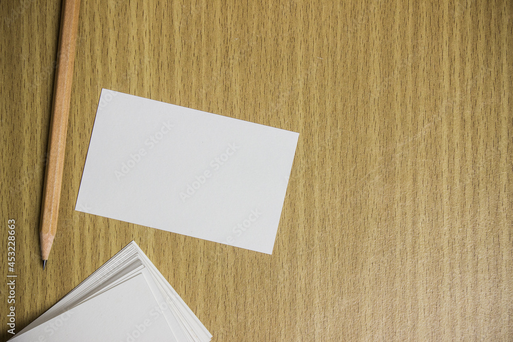 White note on wooden table with copy space. White note on wooden table with copy space.