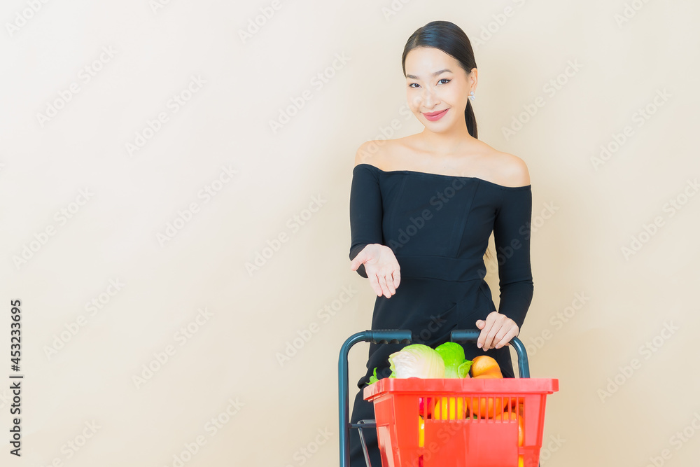 Portrait beautiful young asian woman smile with grocery basket Portrait beautiful young asian woman smile with grocery basket