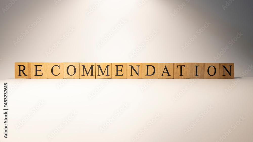 The word recommendation was created from wooden cubes. Consumption and shopping. The word recommendation was created from wooden cubes. Consumption and shopping.