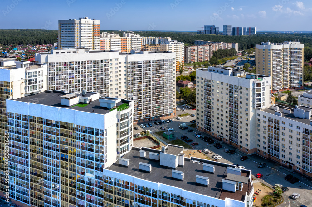 Naklejka premium Top view of modern residential multi-storey buildings