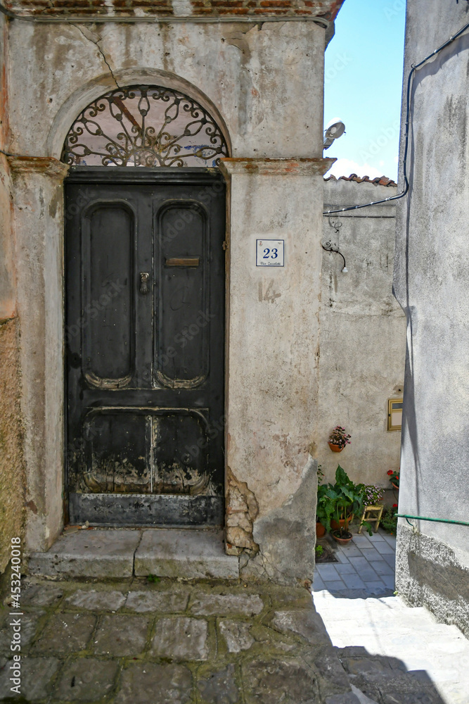 The entrance door to a characteristic house in a small town in the mountains of the province of Potenza, Italy.