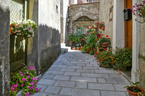 A small street between the old houses of Castelluccio Superiore, a small town in the province of Potenza in Basilicata, Italy.