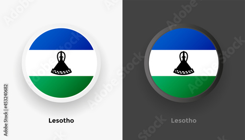 Set of two Lesotho flag buttons in black and white background. Abstract shiny metallic rounded buttons with national country flag