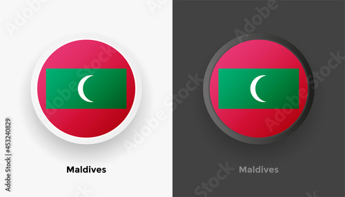 Set of two Maldives flag buttons in black and white background. Abstract shiny metallic rounded buttons with national country flag
