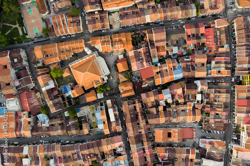 Aerial view showing roof tops of the heritage houses and streets of Georgetown Penang. © ltyuan