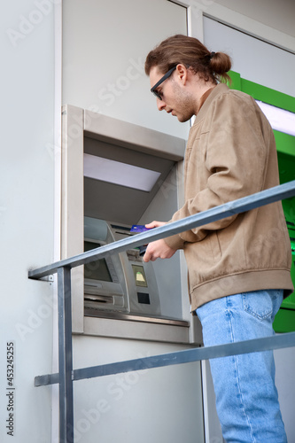 Man withdrawing money from ATM