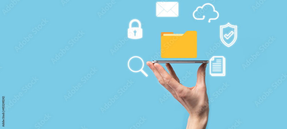 Document Management System DMS .Businessman hold folder and document icon.Software for archiving, searching and managing corporate files and information.Internet Technology Concept.Digital security Document Management System DMS .Businessman hold folder and document icon.Software for archiving, searching and managing corporate files and information.Internet Technology Concept.Digital security