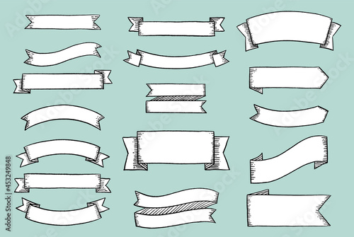 Set of hand drawn retro ribbons and labels isolated on grey background