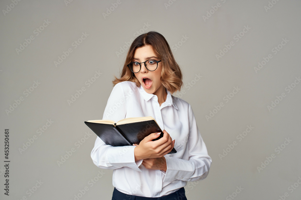emotional woman in shirt manager work documents isolated background