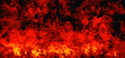 Abstract image of Orange fire or flames with sparkles and smoke in black background.