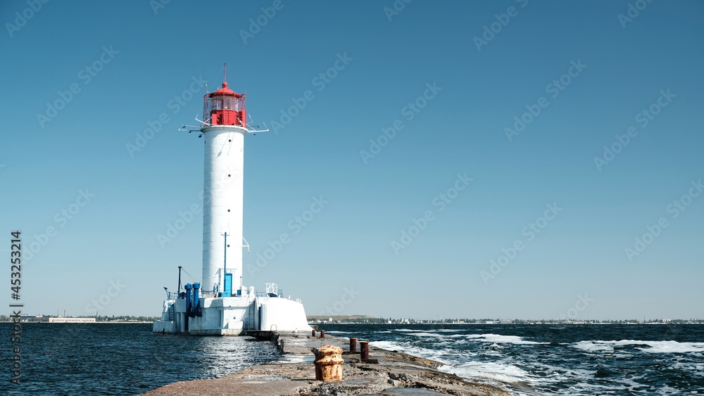 The Vorontsov Lighthouse, pierce and vessels on horizon. Odessa Ukraine