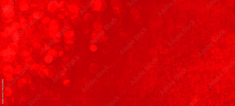 Colorful bokeh lights on red texture - Abstract festive christmas background banner panorama