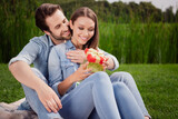 Photo of smiling cheerful good mood lovely couple have romantic date picnic outdoors celebrate anniversary honeymoon