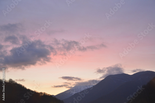 mountains and sky in rosa khutor sochi russia with sunset light © Sergey