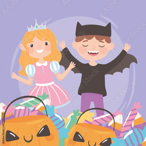 kids with candies and costumes